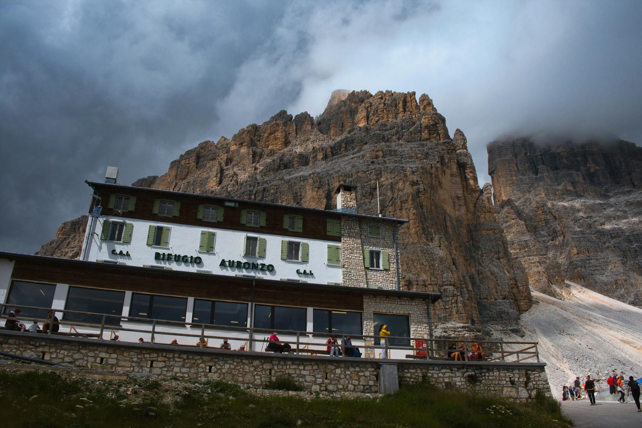 Stunning view of Rifugio Auronzo against Tre Cime di Lavaredo in the Dolomites, Italy.